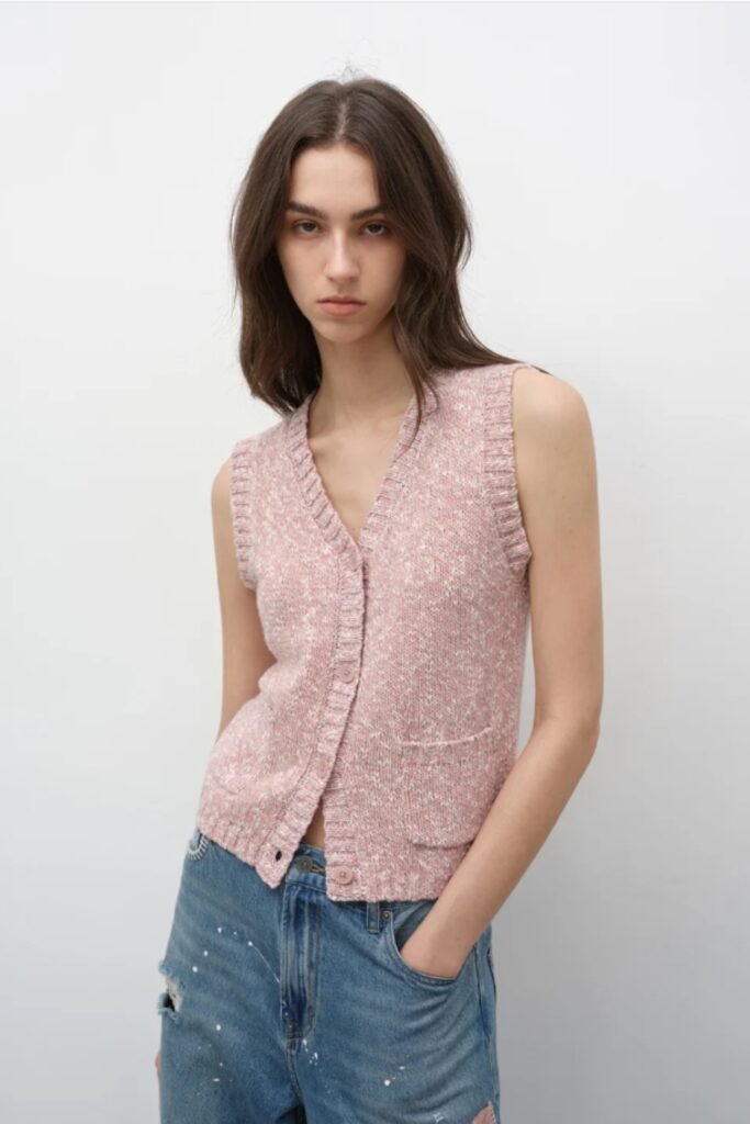 vintage wool vest, dotted knit layering piece, retro V-neck sleeveless top, autumn textural outfit essential, lightweight wool-blend vest, boho fall fashion, 70s-inspired knitwear